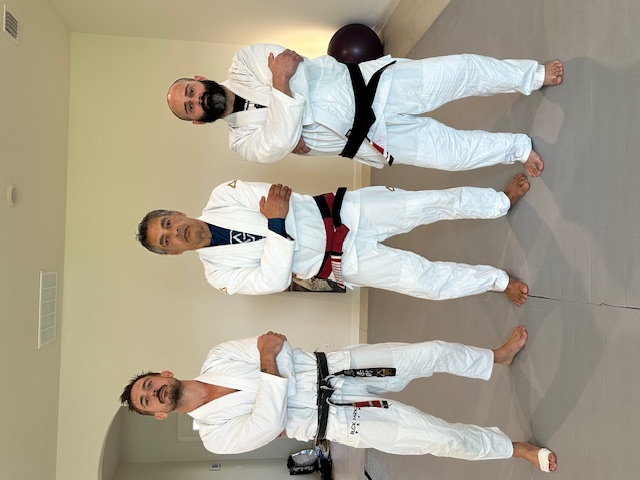 1st Degree from Chris Burns. I owe a lot ot Chris. He helped me refine all of my technique, and showed me details I was missing.  He helped me understand the concepts and principles behind Rickson's Jiu Jitsu, and also how Rickson's Jiu Jitsu has evolved from when he ran an academy with Henry Akins to now. Chris gave me hours upon hours of instruction and fine tuning.  He tested me for my 1st degree over the course of 3 years, and for the final stage of the test, I went with him on tour and was tested for 2.5 weeks straight, including being tested at Rickson's house.  I am honored and humbled to be ranked under Chris, and am forever grateful.  I look forward to continuing to learn from Chris and respresent him. It is an honor to be part of this journey. - Photo 3