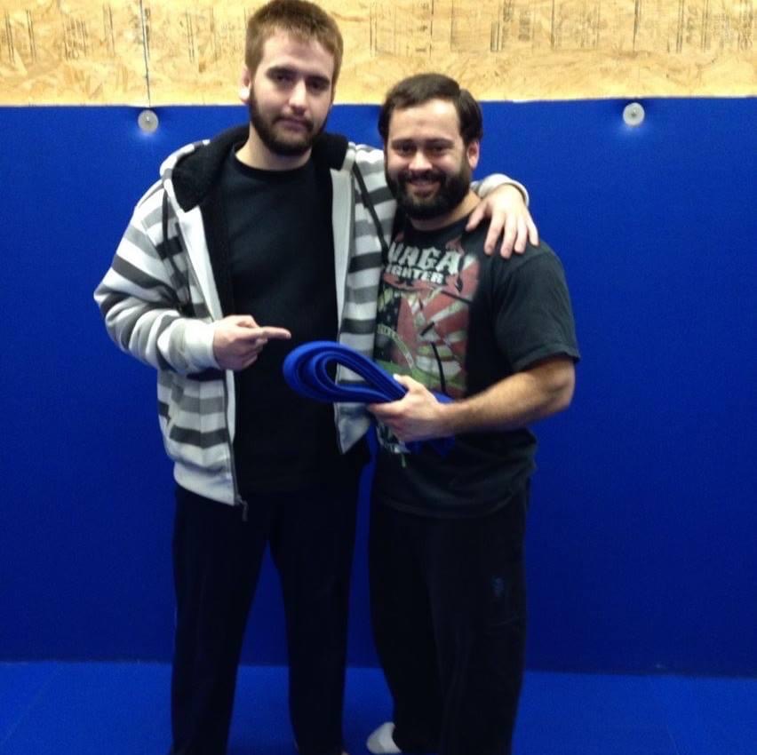 Blue Belt from Sean Bollinger. Sean was Eddie Bravo's 3rd Black Belt. He had started under Royce Gracie and then worked into the 10th Planet System.  Sean really helped my understand how movements and techniques flowed together. - Photo 1